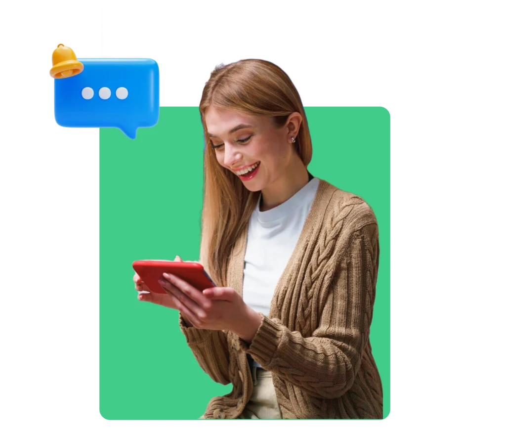 Young woman smiling while using a tablet to manage SMS text message campaigns.